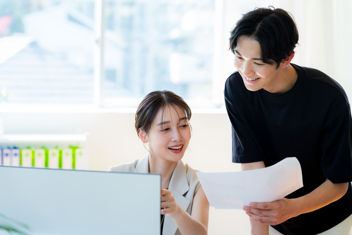 Businesswoman and businessman working in the office